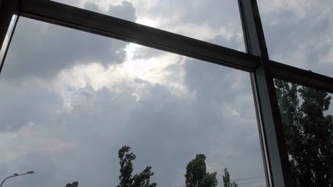 4K timeslapse panoramic view of the sky from window and the poplar swinging in 스톡 동영상 96541688