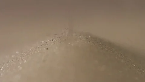 4K Tiny grains of sand gathering at the bottom of a sand timer Stock Footage 71253230