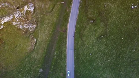 4k Top down aerial car tracking shot on beautiful country road v2 Stock Footage 105858866