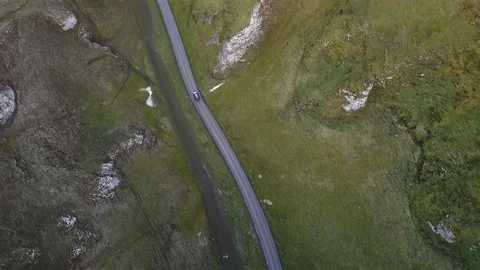 4k Top down aerial car tracking shot on beautiful country road at sunset 2 Stock Footage 105862587