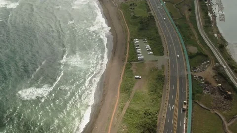 4K Top-down Aerial View of a Beach Leading to Seongsan Sunrise Peak (성산일출봉) Stock Footage 143863962