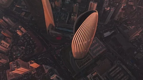 4K Top Down Drone of Curved Landmark Tower and City Traffic Kuwait City Stock Footage 323911566