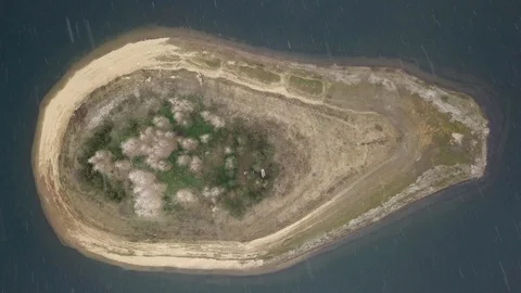 4K Top Down drone video of Island Stock Footage 123293395