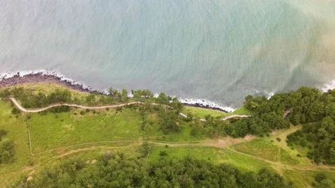 4K Top-down Drone View of Ollegil (올레길), Songaksan (송악산) Mountain, Jeju Island Stock Footage 143864376