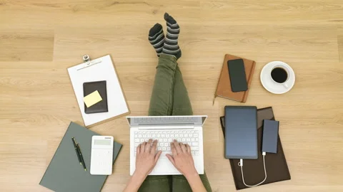 4k top down motion timelapse of working from home Stock Footage 130298008
