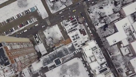 4K Top Down video above snowy city and streets Stock Footage 123293603