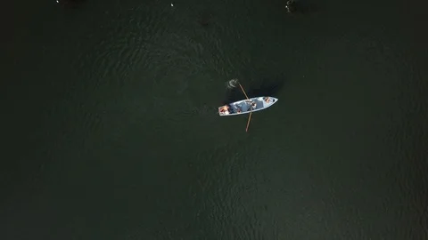 4K Top Down video of boat in the lake Stock Footage 123857780