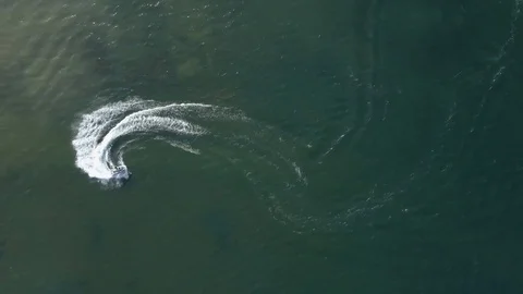 4K Top Down view above jetsky Stock Footage 124657992