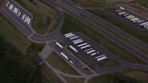 4k top down view of asphalt parking lot for trucks lorry vans highway motorway  Stock Footage 96238944