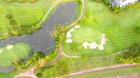 4K Top view Aerial view of Lawn Golf course in the morning or evening light Stock Footage 146727609