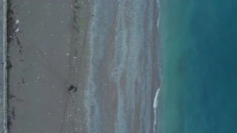 4k Top view of blue waters and sandy beach outdoors in summer irrl. Stock Footage 210163990