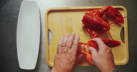 4K Top View Chef breaking Lobster Shell | Stock Video | Pond5