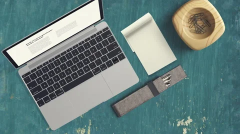 4K - Top view of computer on desk with stuff Stock Footage 62391990