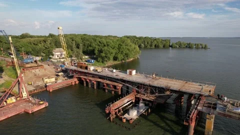 4K Top view of the construction of a bridge across the river Stock Footage 158723587