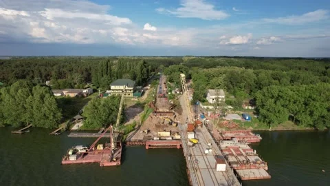 4K Top view construction new bridge over the river work. Stock Footage 155284667