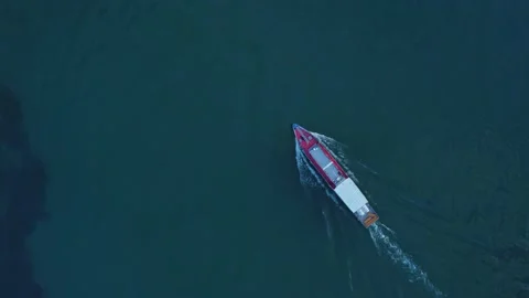 4k Top view of research vessel moves on blue waters outdoors irrl. Stock Footage 219705170