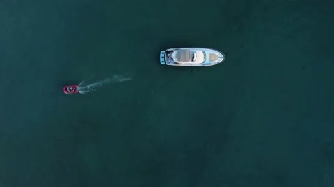 4k Top view of ships move on waters outdoors irrl. Stock Footage 219894988