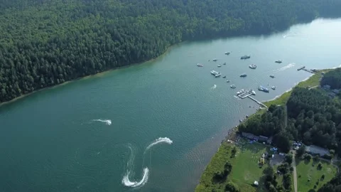 4k Top view of yachts compete on water in picturesque bay irrl. Stock Footage 219894983
