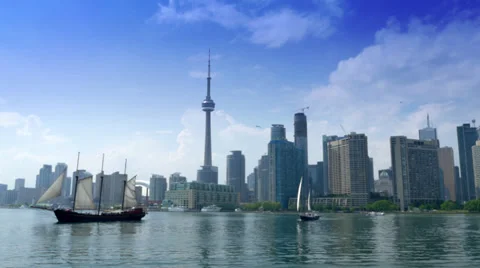4K Toronto Skyline from Lake Ontario with Tall Ships and CN Tower Stock Footage