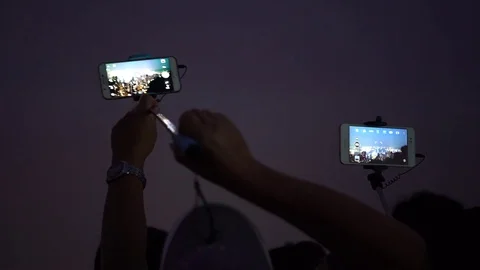 4K Tourist using smart phone take picture in Victoria Peak Hong Kong skyline-Dan Stock Footage 74492028