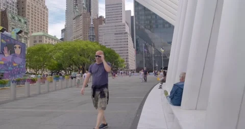 4K - Tourists seating along the oculus, world trade center path station, NYC Stock Footage 205039677