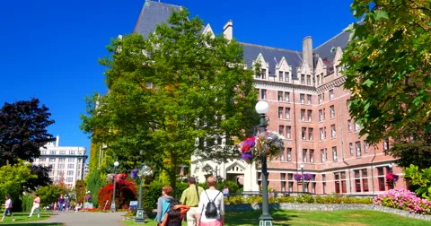 4K Tourists on Side Path, Side Path, Empress Hotel in Summertime Stock Footage 41389115
