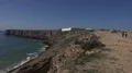 4k Tourists watching rough coastline cliffs and ocean beach at Sagres Portugal 4k or 4k+ Resolution