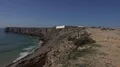 4k Tourists watching rough coastline cliffs and ocean beach at Sagres Portugal 4k or 4k+ Resolution