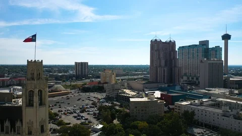 4K Tower of the Americas Texas State Flag San Antonio Texas Afternoon Blue Sky Stock Footage 119720588