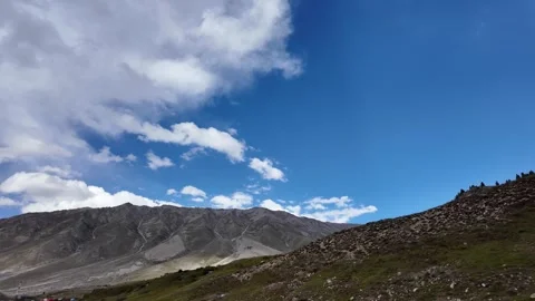 4K Towering Trees Adorn the Slopes of Majestic Green Mountains, with a Remot Stock Footage 288323315