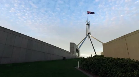 4k Tracking shot of Australian Parliament House towards curved wall at Dusk Stock Footage