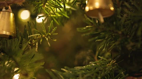 4K Tracking Shot of Christmas Tree with Lights and Golden Bells, Macro Stock Footage 313172428