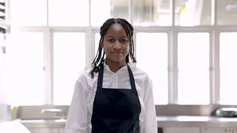 4K tracking view, portrait of young smiling African student walking to came.. Stock Footage 246756993