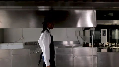 4K, tracking view, young African cooking student decide to quit or give up .. Stock Footage 246756251