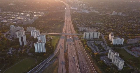 4k traffic overhead looking into sunset static in middle Stock Footage 81288844