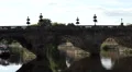 4K traffic passes over pretty bridge on sunny day - long version 4k or 4k+ Resolution