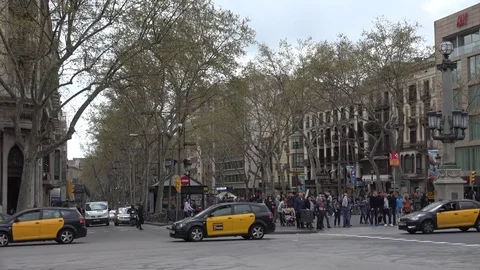 4K Traffic street in downtown Barcelona town taxi car transit road pollution day Stock Footage