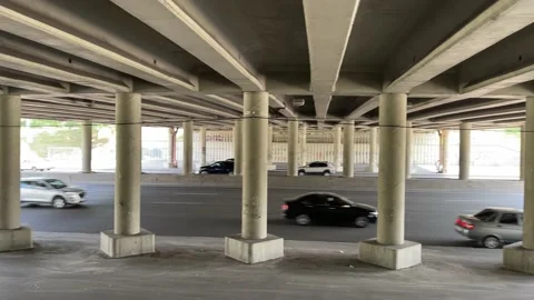 4k Traffic under the bridge during daytime. Stock Footage 158647009