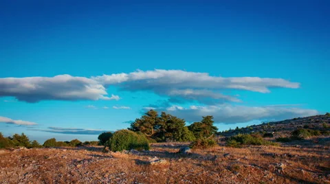 4K trail ends at rocky mountain top, sunset to dusk timelapse Stock Footage 67729569