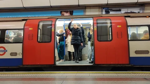 4K, Train Doors Close and Train Departs Station Platform Stock Footage 123872239