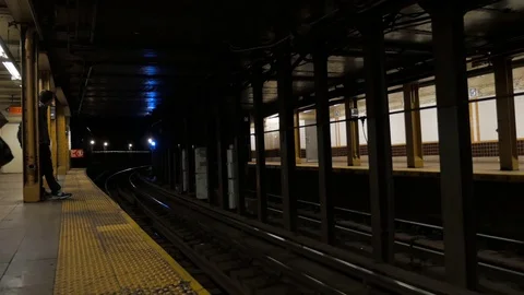 4K Train Entering Station Stock Footage 71475277