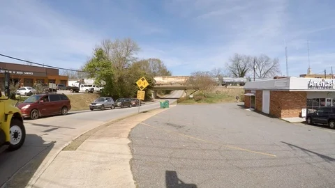 4k-Train Over Traffic Stock Footage 106076521