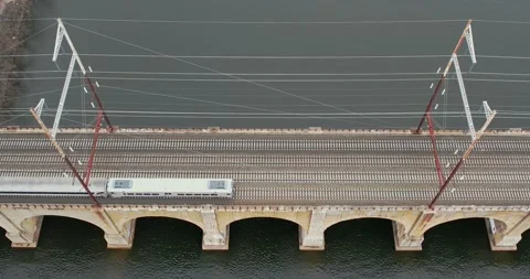4K Train Passing by Railroad Tracks Stock Footage 172311048