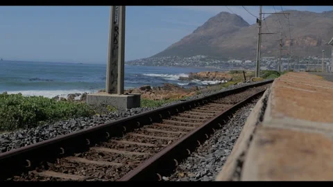 4K Train Tracks with Ocean 스톡 동영상 288435329