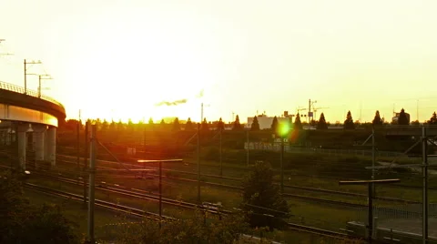 4k trains passing each other at sundown footage  Stock Footage 66185179