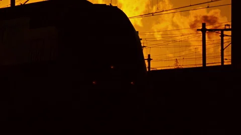 4k trains passing each other at a bright sundown. Stock Footage 66762463