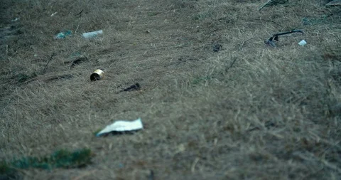 4K Trash on lake beach left from tourists Video stock 105492336