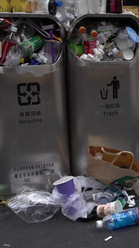 4K Trash spilling out of overfilled trash can on city street Taipei. Taiwan Stock Footage 319154213