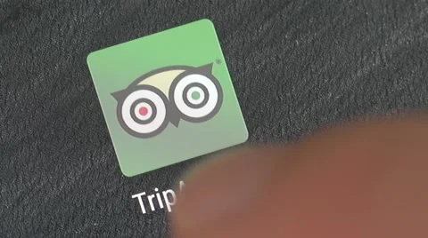 4K TripAdvisor App Launching On Smartphone - Closeup Stock Footage 63513683