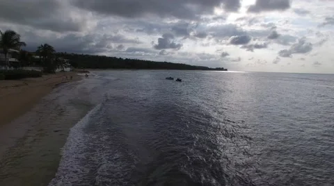 4K Tropical Beach Flying Over Water Stock Footage 63617890
